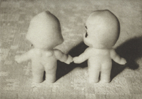 Two Kewpie Dolls